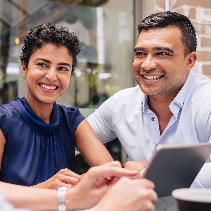 Couple having conversation with the advisor