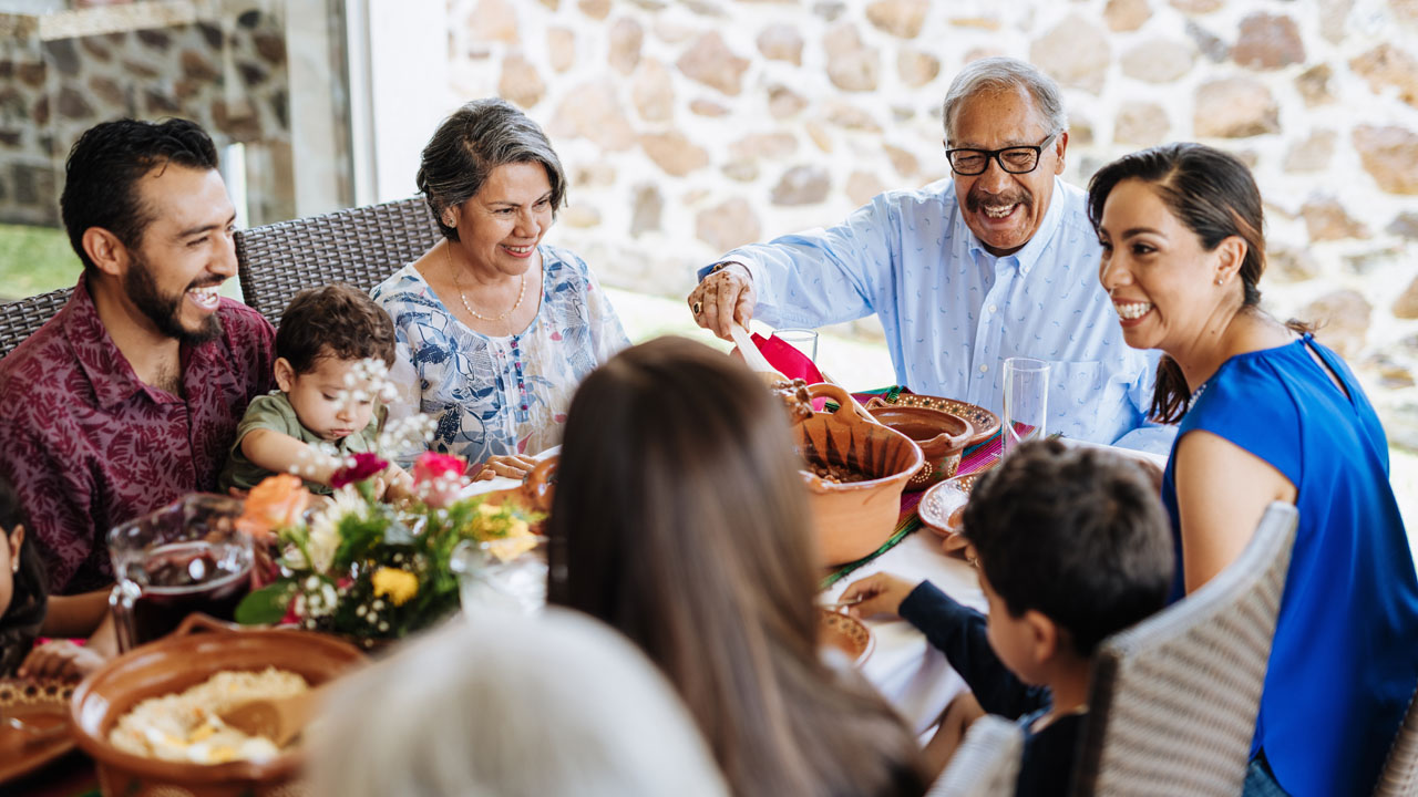 Family having lunch on their backyard